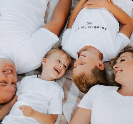 a group of people laying on top of each other