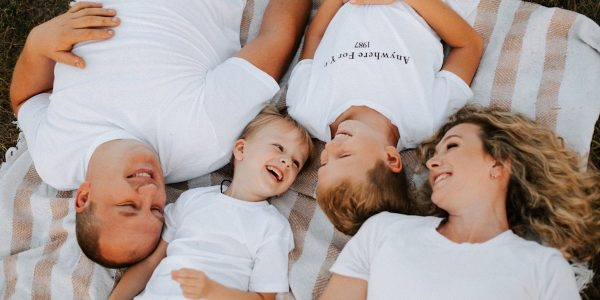a group of people laying on top of each other